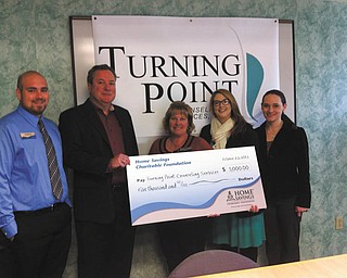 SPECIAL TO THE VINDICATOR
Home Savings Charitable Foundation recently donated $5,000 to Turning Point Counseling Services. The funds will be used for the transition to an electronic health-care records system. From left are Andrew Nemergut, personal banker, Home Savings Liberty office; Joseph A. Sylvester, executive director, Turning Point; Kim Gennaro, branch manager, Home Savings Liberty office; and Jessica Sprowl and Virginia Phillips, development specialists at Turning Point.
