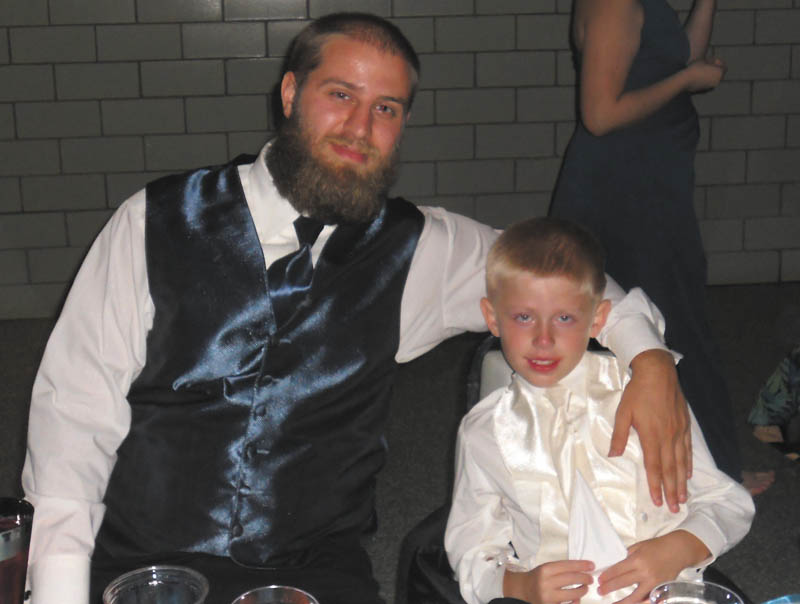 Christina Buccino from Hubbard sent this picture of her cousin, David Woloschak from North Jackson. He has been growing this beard since early this year. She says, Ò Every time we see him at a family function it is fuller and fuller. David loves the hit TV series "Duck Dynasty." This picture was taken Sept. 28 at his brother's wedding. He is shown with his nephew Dominick Woloschak of Niles. He says, "I did it to do it."