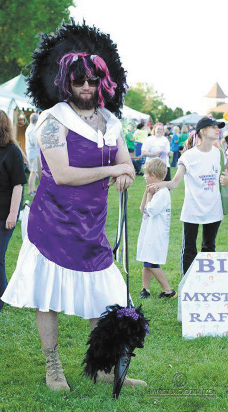 This is a picture of Jesse Strickland taken at the Boardman Relay for Life 2013. Jesse was an Infantryman with the 1-41 out of Fort Bliss, and is an Afghanistan combat veteran. He could come home for visits only a few times a year. His sister, Chary Hively, has gotten involved with the Relay for Life over the years. The running joke between them was that he would be her Miss Relay entry when he got out of the service. He came home late in 2012, and for this year's Relay for Life he kept that promise to his sister.
