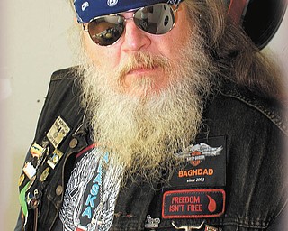 Hairy George Nitzsky of Youngstown has had this beard long enough to be known as Hairy George all of his adult life. He says, “My beard and my hair keep me warm while I ride.” Submitted by Patricia Ott.