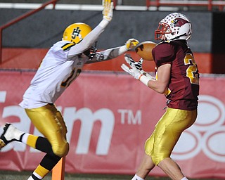 Mooney #21 Tim Durkin catches a pass in the end zone for a touchdown after getting behind John Hay #10 Treyvon Akins during the 3rd quarter of Friday nights game.