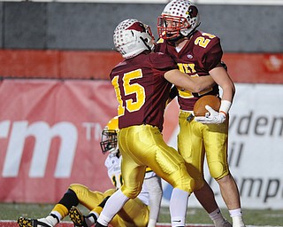 Mooney #21 Tim Durkin and Denver Martin #15 celebrate after a Durkin touchdown reception in the 3rd quarter. John Hay #10 Treyvon Akins pictured.