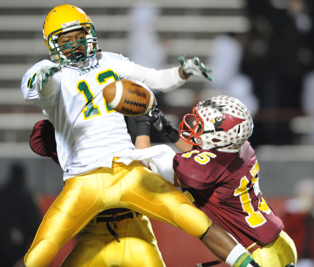 John Hay #12 Marquell Jones watches as the football falls to the turf after Mooney #15 Denver Martin broke up the pass during the 3rd quarter of Friday nights game.