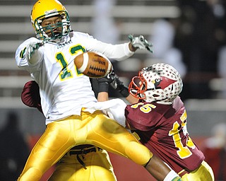 John Hay #12 Marquell Jones watches as the football falls to the turf after Mooney #15 Denver Martin broke up the pass during the 3rd quarter of Friday nights game.