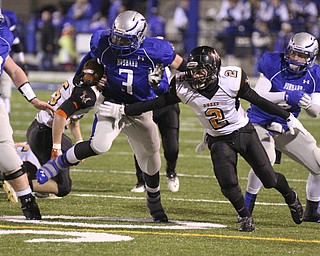 william D. Lewis | The Vindicator. LJ Scott (3)of Hubbard eludes Marlington's Jake Walker(2) during 1rst half playoff action at Hubbard 11082013.