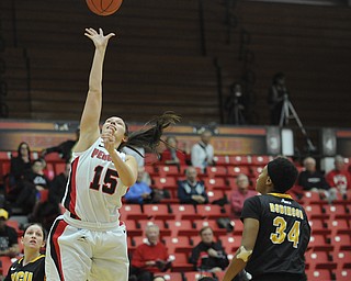 Youngstown State #15 Heidi Schlegel puts up a floater under the basket while VCU #34 Keira Robinson watches.