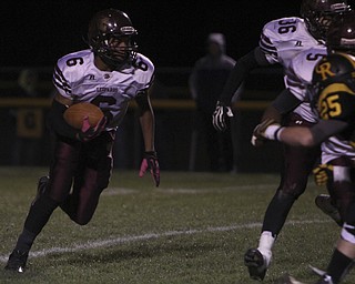 Liberty's Lynn Bowden (6) looks for a seem in the Crestview defense during the first quarter of Saturday's OHSAA playoff game at Crestview High School. Dustin Livesay | The Vindicator 11/9/13 Crestview High School.