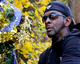 MADELYN P. HASTINGS | THE VINDICATOR..Vincent Campbell of Ferrel, PA places a decorated cross at the site of a two vehicle car accident along Connelly Blvd. near the intersection of Route 62. The accident caused three deaths with four others injured at around 10:00 p.m. on Friday, November 10, 2013. ... - -30-..