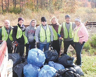SPECIAL TO THE VINDICATOR
Boardman Lions Club joined forces with Boardman High School National Honor Society members and cleaned a stretch of the roadside along Southern Boulevard between Western Reserve Road and Route 224. They collected 42 bags of trash and six bags of recyclable materials, including a $5 bill, while working in conjunction with the County Engineer’s Office and the Green Team. Above, from left, are John Landers, Lions Club member; Rudy Tepsick, Dante DeLullo and Tommy Sodeman, NHS members; Joni Blase and Terry Shears, Lions Club members; and Alex Gordon, NHS member. King Lion Ron Paris also participated in the cleanup.