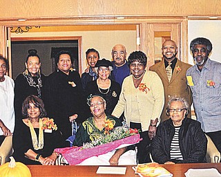 SPECIAL TO THE VINDICATOR
The Altar Guild Ministry of New Bethel Baptist Church, 1210 Himrod Ave., Youngstown, honored a lifetime member, Lorene Buggs, at its annual Harvest luncheon Oct. 26. Because of an illness, her daughter Clarice Dowdy represented her. The Rev. Lewis W. Macklin was the guest speaker. Above are some of the guild members who later presented Buggs with roses, a corsage and other gifts at Campus Health Care Center, Colonial Drive. Seated from left are Catherine Leftwich, president; Buggs, the honoree; and Geri Cowart. Standing are Barbara Page, vice president; Earline London; Linda Poindexter; Connie Southerland; Brenda Averhart; John Averhart; Vera Harris, chairwoman; the Rev. Kenneth L. Simon, pastor; and James Buggs, the honoree’s husband.