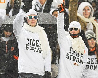 Sharon High students wore Tiger Strong shirts at Monday’s playoff game in Erie. The game was postponed from Saturday after two Sharon players were killed in a car accident on Friday.