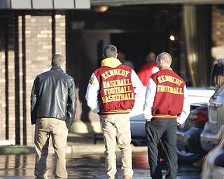 Members of the JFK football team walk in together to pay their respect to Corey Swartz at J. Bradley McGonigle Funeral Home in Sharon - mourners paid their respects to Corey who passed away during a car crash Friday Night. Corey was a football player for the Sharon Tigers.