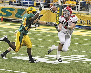Youngstown State receiver Nate Adams catches a pass in last year’s 48-7 loss to North Dakota State. The Penguins are hoping for a better result on Saturday when they play at Stambaugh Stadium.
