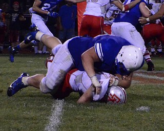 Western Reserve Lineman #68 Matt Mace tackles Cuyahoga Heights
