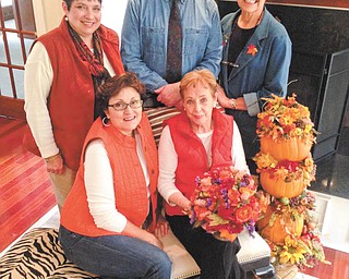 SPECIAL TO THE VINDICATOR
Salem Storybook Museum will feature a gala home tour from 5 to 9 p.m. Nov. 22 and 11 a.m. to 4 p.m. Nov. 23, starting at the plaza at Kent City Center, North Lincoln Ave., Salem. Tickets bought in advance cost $15, and the day of the tour, $20. The event, Come Home for the Holidays, will feature five decorated homes in a candlelight tour. Seated are Jennifer Brown, left, and Elizabeth Thatcher, museum director. Standing are Sondra O’Donnell, Robert Viencek, museum board member, and Karen Carter. To make reservations call 330-332-1632 or 330-332-4723. Homes will be decorated for either Thanksgiving or Christmas.