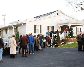 Friends of John Zdelar line up out the door at the Lane Madasz Funeral Home in Brookfield Township on Wednesday. He was among three who died in a car accident Friday night in Sharon.
