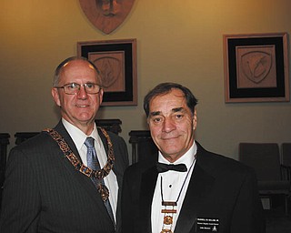 SPECIAL TO THE VINDICATOR
Russell W. Gillam Jr. of Canfield was appointed District Deputy Grand Master of the 24th Masonic District on Oct. on 19 at the 204th Annual Communication of the Free & Accepted Masons in Akron. Gillam is past presiding officer in the Youngstown Chapter of Royal Arch Masons, Buechner Council and St. John’s Commandery Knights Templar and has received many awards. He also is a member of many other Masonic and community organizations. Above are Gillam, at right, and Kevin B. Todd.
