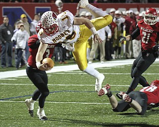 William D Lewis The Vindicator Mooney's Jon Saadey(16) cartwheels into the end zone for 1rst qtr TD against Struthers during playoff action Friday in Niles.