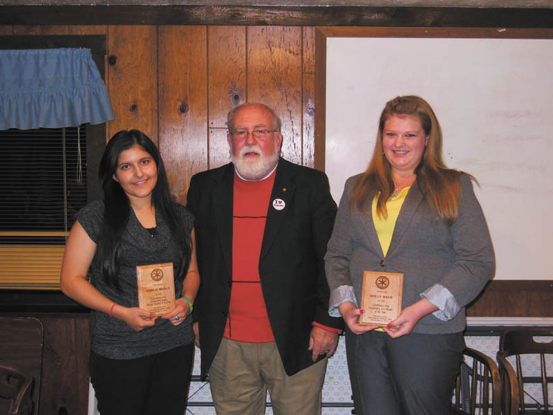 SPECIAL TO THE VINDICATOR
The Columbiana Rotary Club presented youth awards for 2013 during its annual dinner Nov. 5. Students are selected on the basis of scholarship, character and service and were presented with plaques. From left are recipient Pam Baer, 4-H member; presenter Terry McCoy, Rotarian; and recipient Carlie Merlo, Interact Club. 
