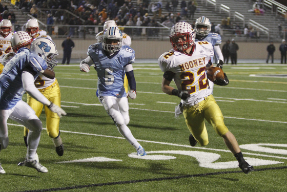  .          ROBERT  K. YOSAY | THE VINDICATOR..#22 mark handel  takes the ball almost to the endzone  (driven out at the two -mooney scored as he is chased by #12 Dom Berdysz and #6 Iman Glanton - for Benedictine..Cardinal Mooney Cardinals vs Cleveland Benedictine Bengals in Solon.....-30-