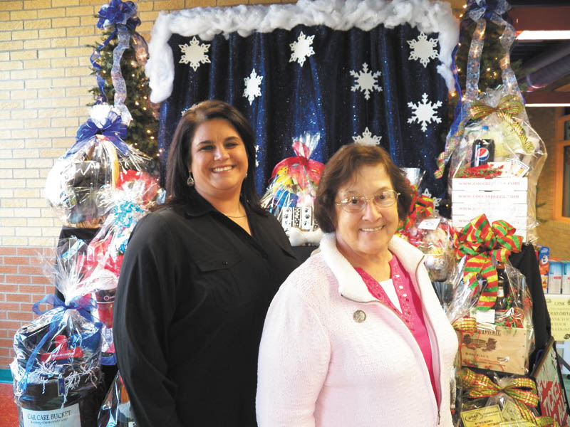 SPECIAL TO THE VINDICATOR: Preparations are being made for the Ursuline Preschool and Kindergarten’s 25th annual Once Upon a Christmas craft show Dec. 7. Above are craft show chairwoman Christy Durham, left, and Sister Charlotte Italiano, school principal.