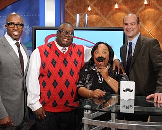 Deryck Toles, left, a former NFL player and founder of Inspiring Minds in Warren, Rev. Lewis Macklin, Madonna Chism Pinkard and Dr. Dan Ricchiuti took a pre-Movember photo on the set of WFMJ's Community Connection.