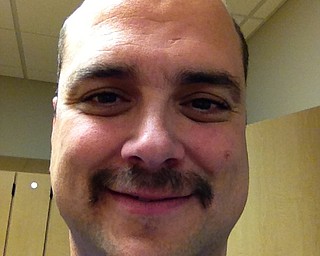 Dr. Dan Ricchiuti M.D., a urologist and surgeon, showed off how his mustache was progressing mid-way through Movember.