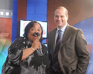Madonna Chism Pinkard, host of Community Connection on WFMJ, joined in on Movember fun with Dr. Dan Ricchiuti.