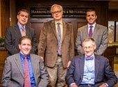 At the urging of Harrington, Hoppe and Mitchell attorney and cancer survivor Patrick K. Wilson, seated at front left, HHM colleagues participated in Movember and grew facial hair to raise awareness of prostate and testicular cancer. In a pre-Movember photo, joining  Wilson are Alan D. Wenger, Matthew M. Ries, standing at left, James L. Blomstrom and Vito J. Abruzzino.