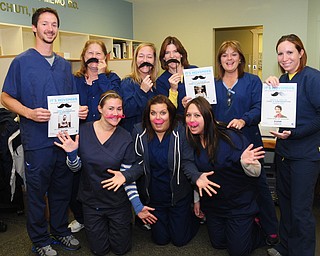 The staff at NEO Urology in Boardman displayed their Movember spirit. Employees include, front from left, Emily Baluch, Carley Michaels, Jessica Kucek, and back row, Raymond Lillo, Shirley Nemec, Sandy Smith, Jane Rosinski, Lori Fitch and Nicole Krut-Heim. Lillo participated in the Movember event with a mustache.