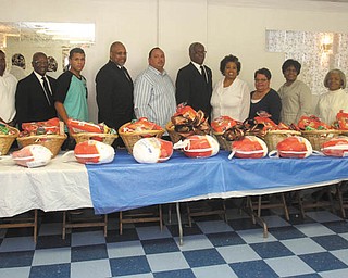 THE VINDICATOR | WILLIAM D. LEWIS: Covenant Lodge 59 Prince Hall F&AM and Covenant Chapter 48 Order of the Eastern Star distributed 10 food baskets to those less fortunate. The baskets were filled with canned goods, mixes, dinner rolls and turkeys to complete a Thanksgiving dinner. Those involved in the food giveaway at Eastern Star Covenant Lodge, from left, were Semmie Gilmore, Malik Mostella, John R. Clark, Jose W. Reyes, Marshall V. Coney, Jose L. Reyes, Ronald Armour, Barbara Benford-Jackson, Alba Reyes, Dorothy Henry, Betty Crafter-Royal, Deloris Murphy and Sylvia Gilmore. Save A Lot and an anonymous donor also helped with filling the baskets. W. Reyes, Marshall v. Coney, Jose L. Reyes, Ronald Armour, Barbara Benford-Jackson, Alba Reyes, Dorothy Henry, Betty Crafter-Royal, Deloris(correct) Murphy and Sylvia Gilmore.