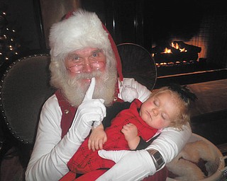 Sydney Rose Spin fell asleep while waiting to see Santa at the Akron Children’s Holiday Party.  She was just a year old. She lives in Boardman with her family and Mom, Connie, sent the picture.