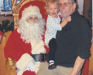 Even a little help from Grandpa Russ didn't convince Mena Monroe, 3, that there was nothing to be afraid of.