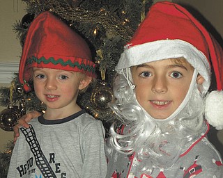 Big brother Anthony Triveri, 7, has been trying really hard this season to get his little brother Kyle, 2, to sit on Santa's lap with him by dressing up like Santa and acting the part. Kyle is skeptical, but Anthony is determined to get a picture with him somehow. Submitted by their mom, Kim Triveri.