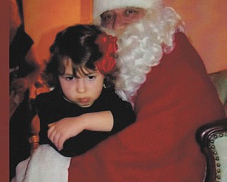 Gianna Dutton was upset because Santa was giving little gifts to the children. Gianna's sister Alayna sat on Santa's lap first, so she thought there were no more gifts for her. Her parents are Jeff and Becky Dutton and grandparents are Ellie Dutton and Lou and Nancy Schepka. All live in Poland.