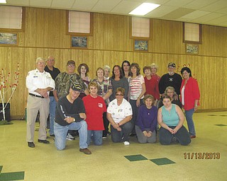 SPECIAL TO THE VINDICATOR
Above, American Legion Post 737 volunteers prepared for the Veterans of Wade Park to arrive Nov. 13 for a meal, karaoke and dancing. Kneeling, from left are John Chittock, Joyce Street, Kathy Rutushin, Mary Ann Leonard, Elizabeth Ahart and Kathy Bittinger; and standing are Jim Boehmer, commander; Dave Hahlen; Gary Davis; Stacey Carritz; Eileen Carritz; Faye Hunberston; Marie Hoppel; Holly Barr; Phyllis Nuzzie; Linda Glunt; Donna Loomis; Bud Bittinger; and Jodi Minotti.