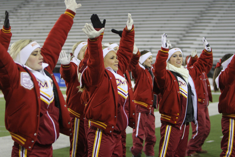 The Cardinal Mooney cheerleading squad leads the crowd in the chanting of Mooney's Alma Mater in the closing minutes of the fourth quarter of the Division four Semi-Finals against Steubenville at Fawcett Stadium in Canton on Friday.  The Cardinal's beat Steubenville 37-7 and move on to play Clarksville Clinton-Massie for the Division four State Championship. Dustin Livesay  |  The Vindicator  11/29/30  Fawcett Stadium, Canton Ohio.