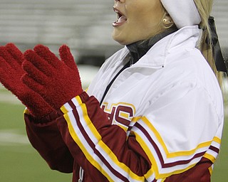 Cardinal Mooney senior Nicolette Filo cheers on the Cardinals as time expires on the Division four Semi-Finals matchup against Steubenville at Fawcett Stadium in Canton on Friday night.  The Cardinals beat Steubenville37-7 and advance to the State Championship game against Clarksville Clinton-Massie.  Dustin Livesay  |  The Vindicator  11/29/30  Fawcett Stadium, Canton Ohio.