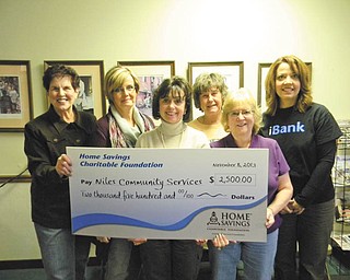 SPECIAL TO THE VINDICATOR
Home Savings Charitable Foundation recently donated $2,500 to Niles Community Services to support its program of providing for those in need in the Niles area. For information on Niles Community Services call 330-652-6412. Above from left are Jean Williams, executive director of Niles Community Services; Lori Antonelli, Jackie Bell, Anna Mae Cushna and Shirley George, volunteers for NCS; and Trish Mohan, branch manager for Home Savings main office.