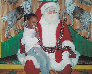 Leilana Pete, 7, visited with Santa at Macy's in New York. Sent by grandmother Othella May.