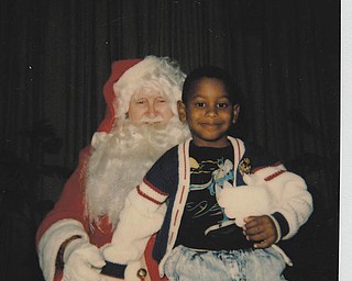 Michael Pete was 4 at the time of this visit with Santa. Sent by his mom, Othella May.