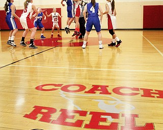 The basketball court at Canfield Village Middle School is dedicated to Ken Reel, a longtime teacher and coach who died of cancer in June. A game between the Canfield and Hubbard girls teams tipped off after Tuesday’s ceremony.