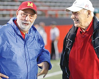 Don Bucci, right, is one of just four head coaches in Cardinal Mooney football history. Bucci took over in 1966 and spent 34 seasons leading the Cardinals. He guided Cardinal Mooney to four state championships before retiring from coaching and taking over as athletic director. Bucci is pictured with former Cardinals basketball coach Roy Nard.