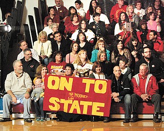 Families and friends cheer on the Cardinal Mooney Cardinals at a pep rally Thursday at the high school. The school sent the team off this morning to play in the Division IV championship game against Clinton-Massie at 3 p.m. in Massillon.