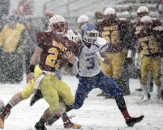 William D Lewis The vindicator Mooney'sMark Handel(22) is stopped by Clinton Devin Salley(3).