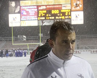 William D Lewis The Vindicator Mooney coach  PJ Fecko walks off the field after loosing state chapionship 27-21 in Massilon Dec 6, 2013.