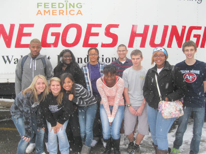 SPECIAL TO THE VINDICATOR
Austintown Fitch Interact Club, sponsored by the Rotary Club of Austintown, recently conducted its semiannual food drive to benefit Second Harvest Food Bank. Andrea Folsom’s English department classes contributed 262 items of the 1,500 cans and boxes donated. Advisers for the group are Tina Kubacki and Gary Reel. In front, from left are Chelsea Raymer, Alex Corradi, Sierra DuBois, Latrice Nelson, Chad Holmes, Jasmine Washington and Mike Vinkler; and in back are Ron Shadd, Shay Edwards, Kamisha Parker and Ricky Ferry. Other club members are Colin Wilson and Alec Kalis.