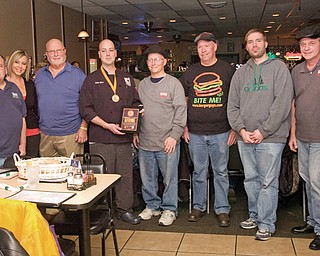 From left to right, are John Spatar, Lisa Neeld-Infante, Bob DeVicchio, Mel McKee, Anthony Fuda, Scott Long, Eric Tranovich and Jerry Tranovich at Bogey’s Bar and Grill in Lowellville.