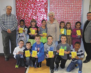SPECIAL TO THE VINDICATOR
Struthers Rotary is continuing its participation in the Dictionary Project, which assists students in becoming good writers, active readers, creative thinkers and resourceful learners. Educators believe third grade is the dividing line between learning to read and reading to learn. Struthers Rotary provides dictionaries to all third-grade students at Campbell, Lowellville, Struthers and St. Nicholas schools. From left are Rotarians Tom Baringer, Mary Ann Morell and Anthony Quahliero with third-graders from Struthers.