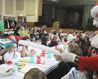 William D Lewis The Vindicator Aut Mori Grotto clown J.J. aka James Losasso, entertains children at StruthersRotary Christmas party 12-17-13 at Struthers Presbyterian Church.